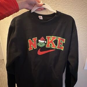 Nike Grinch Black Crewneck Sweater with Red and Green Design